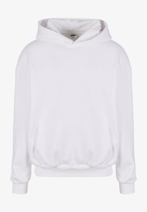 Valge kapuutsiga särkmantel, mis on valmistatud pehmest kangast, sisaldab suurt kapuutsi, eesmist taskut ja elastseid varruka ning allääri. Minimalistlik disain.