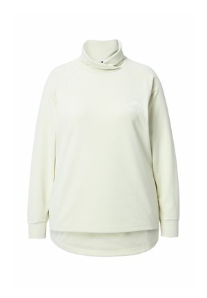 Lysegul polo trøje lavet af ribbet stof, med lange ærmer og en afslappet pasform. Indeholder en lille bjerggrafik på brystet.