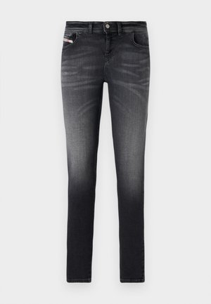 Dark gray slim-fit jeans made from denim. Features a faded finish, standard five-pocket design, and front button closure.