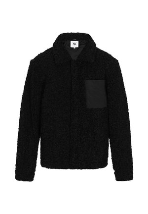 Juodas pūkuotas švarkas, pagamintas iš tekstūruoto audinio, su smailiu apykakle ir kontrastinga juoda kišene kairiajame krūtinės šone.