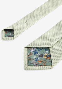 Next TEXTURED - Solmio - sage green