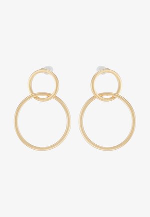 Náušnice zlatej farby v tvare dvojitých kruhov, s malým krúžkom pripojeným k väčšiemu krúžku, vybavené zámkami na zadnej strane.