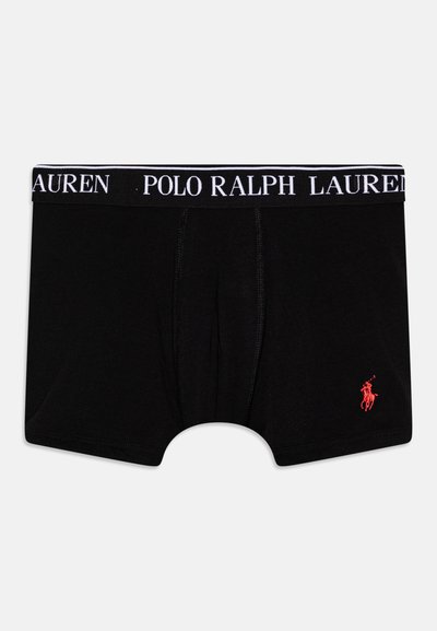 Boxers negros con una textura suave, con una cinturilla blanca que lleva el logo "POLO RALPH LAUREN" y un pequeño diseño de un jugador de polo bordado en rojo.