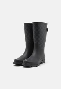 Bottes en caoutchouc noires étanches avec un dessus à motifs comprenant des motifs géométriques, une finition texturée et une semelle robuste à crampons.