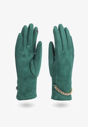 Guanti in suede verde con una superficie liscia, dotati di un accento in catena dorata. Design a cinque dita con un sottile dettaglio del logo su un dito.
