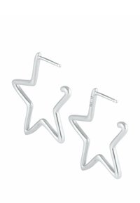 Orecchini a cerchio a forma di stella argentata con design ondulato, caratterizzati da una finitura metallica elegante e un profilo sottile.