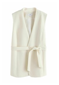 Ärmellose cremefarbene Blazer-Weste mit tiefem V-Ausschnitt und Stoffgürtel, der in einer Schleife in der Taille gebunden ist.