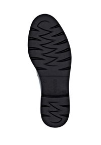 Semelle de chaussure en caoutchouc noire avec un motif en zigzag texturé, présentant un bout arrondi et des accents structurels près du talon pour une meilleure traction.