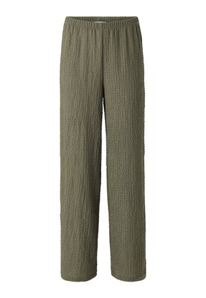 Olivengrønne teksturerede bukser med elastisk talje og brede ben, med et krøllet stofmønster, vist fladt på en hvid baggrund.