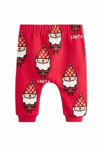 Červené bavlněné kalhoty s opakujícím se designem Santy, který nese károvanou čepici a slovo "SANTA." Měkký, elastický pas pro pohodlí.