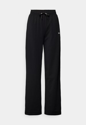 Black sweatpants made of soft fabric, featuring an elastic waistband with a drawstring, wide legs, and a small logo on the side.