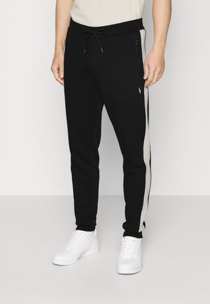 Pantalones deportivos - black