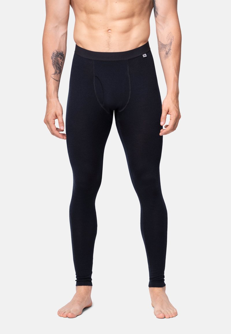 Sorte leggings lavet af blødt materiale, med en tætsiddende pasform, elastik i taljen og en åbning foran. Velegnet til lag-på-lag eller som activewear.