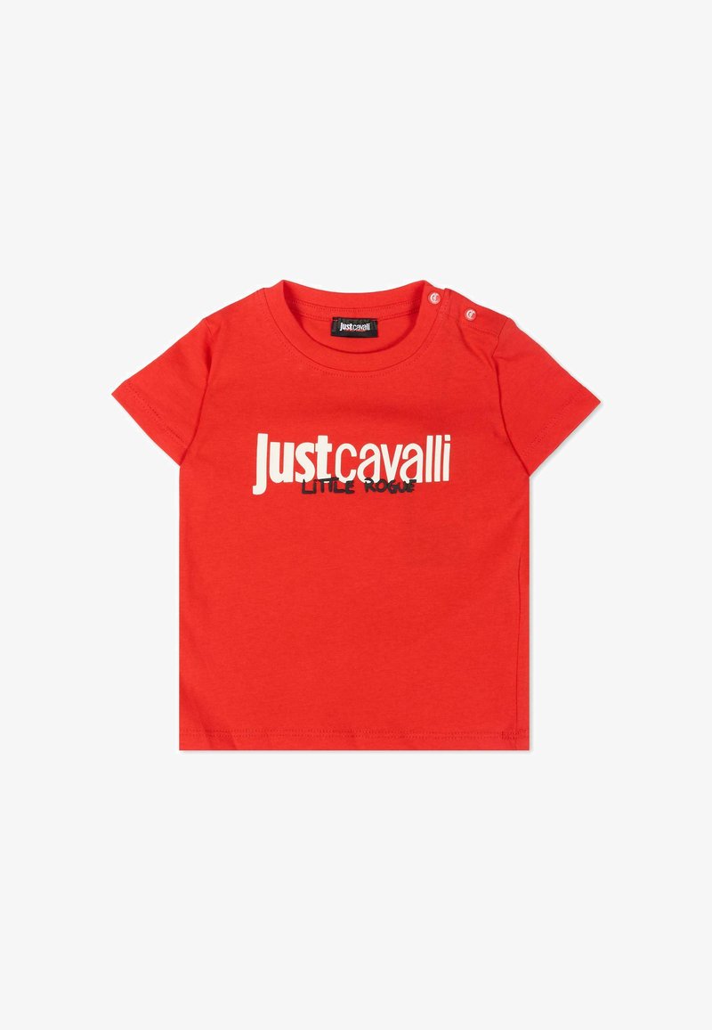 T-shirt bébé rouge à manches courtes avec inscription blanche "Just cavalli" et plus petite inscription noire "LITTLE ROGUE", deux boutons-pression aux épaules.