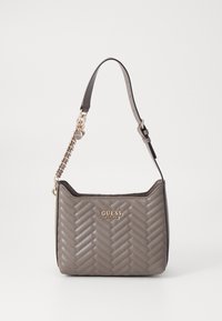 Gray quilted handbag with a subtle herringbone pattern, gold-tone hardware, and an adjustable strap featuring a chain accent. Brand logo displayed.