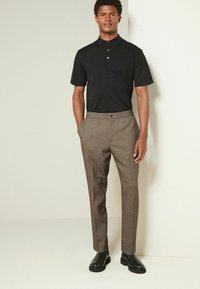Next TEXTURED - Pantaloni - brown taupe
