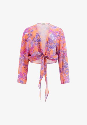 Haut enroulé de style crochet avec un motif paisley orange et violet, à manches longues et fermeture par lien à l'avant. Tissu léger et transparent.