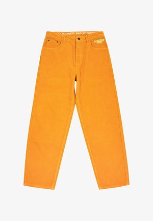 Oranžové kordové volné kalhoty se středním střihem, pěti kapsami a pasem s nášivkou "The Original Baggy Pants."