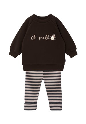 Dark brown long-sleeve top with "oh milk" and baby bottle graphic, paired with beige and dark gray horizontal striped pants.