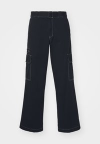 Black cargo pants with wide legs, featuring two side pockets, contrasting stitching, and a standard waistband. Soft cotton material.
