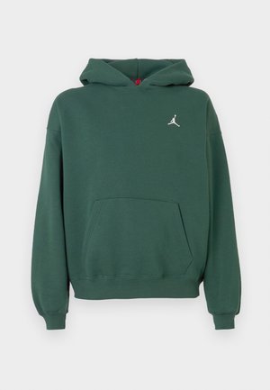 Zelená mikina s kapucňou vyrobená z mäkkej tkaniny, s klokaním vreckom a malým bielym logom Jordan na hrudi.