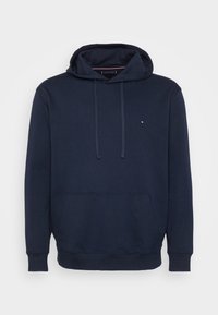 Felpa con cappuccio blu navy in cotone, con tasca frontale, cordini e un piccolo logo con accenti rossi e bianchi sul petto.