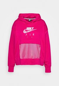 Rosa hoodie med dragsko, med ett nätpanel framtill och en stor vit Nike Air-logotyp. Mjukt material och avslappnad passform.