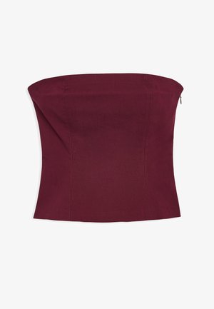 Top bez ramiączek w stylu gorsetu w ciemnoczerwonym kolorze z pionowym przeszyciem i bocznym zapięciem na zamek.