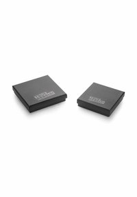 Black square boxes with hinged lids, featuring the text "TRUE REBELS!" embossed in silver on the lid. Smooth matte texture.