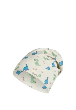 White baby beanie hat with blue and green dinosaur prints and a small beige label with brand name.