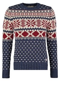 Pull bleu marine en maille avec motifs géométriques et flocons de neige blancs et rouges sur la poitrine et les épaules, poignets et ourlet côtelés.