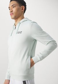 EA7 Emporio Armani Mikina so zipsom - ghiaccio
