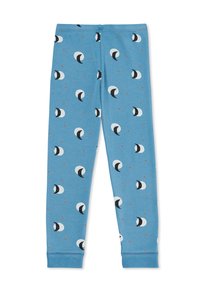 Leggings bleus en tissu doux, ornés d'un motif de croissants de lune blancs et noirs parsemés de petites étoiles orange.
