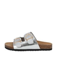 Silver metallic slide sandals with two adjustable straps, adorned with rhinestones, and a textured cork footbed. Black rubber sole.