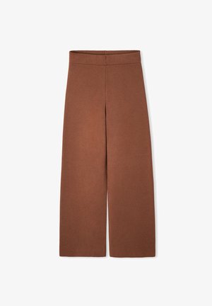 Brązowe spodnie o szerokich nogawkach wykonane z miękkiej, teksturowanej tkaniny. Posiadają wysoki stan i brak widocznych zapięć.