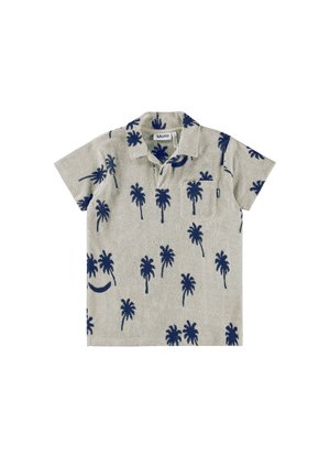 Polo-skjorte laget av teksturert stoff, med et marineblått palmebladmønster på en lys beige bakgrunn, med korte ermer og en lomme foran.