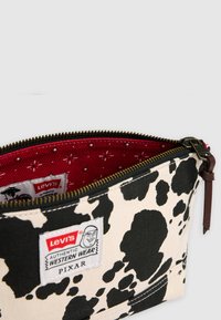 Levi's® TOY STORY COW POUCH - Vrecko na pranie - black/white