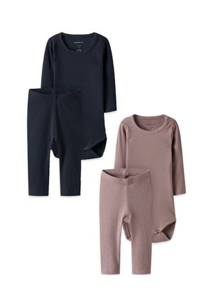 Two sets of ribbed baby clothes, each with a long-sleeve bodysuit and matching pants, in dark blue and light brown colors.