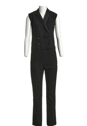 Combinaison blazer noire sans manches à double boutonnage avec col à revers et pantalon droit, présentée sur un mannequin blanc.