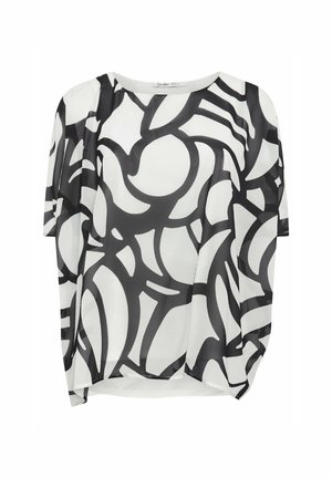White blouse with large black abstract pattern. Short sleeves, scoop neckline, and a relaxed fit. Lightweight, smooth fabric with minimal draping.
