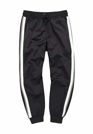Czarne sportowe spodnie dresowe z białymi i szarymi pionowymi paskami po zewnętrznej stronie nóg, elastycznym paskiem w talii ze sznurkiem oraz elastycznymi mankietami przy kostkach.