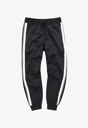 Pantaloni da jogging atletici neri con strisce verticali bianche e grigie sui lati esterni, vita elasticizzata con coulisse e polsini elastici alle caviglie.