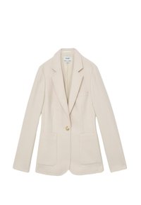 Beežist tekstuuriga kangast pintsak, millel on üks kuldne nupp, kaks eesmist taskut ja sälguline krae.