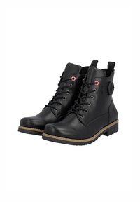 Bottines en cuir noir à lacets à l'avant, avec œillets rouges et une boucle sur le côté. Dotées d'une semelle marron texturée et de détails cousus.