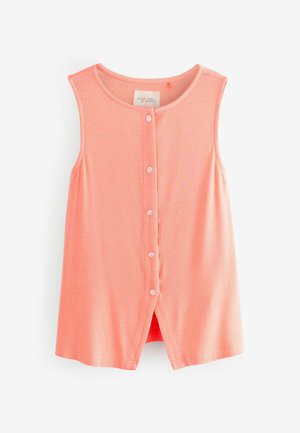 Peachfarvet, ærmeløs ribbet top med rund halsudskæring og knaplukning foran. Har en afslappet pasform og en let udvidet form.