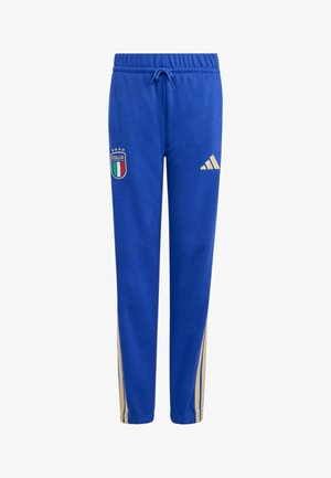 Pantalon de sport bleu avec écusson de l'Italie sur la cuisse gauche, logo Adidas sur la cuisse droite, taille élastique avec cordon de serrage et bandes latérales beige.