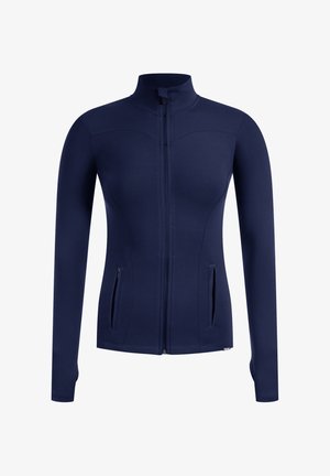 Marineblå zip-jakke med høj krave, lange ærmer og to frontzip-lommer; lavet af strækbart materiale med en tætsiddende pasform.