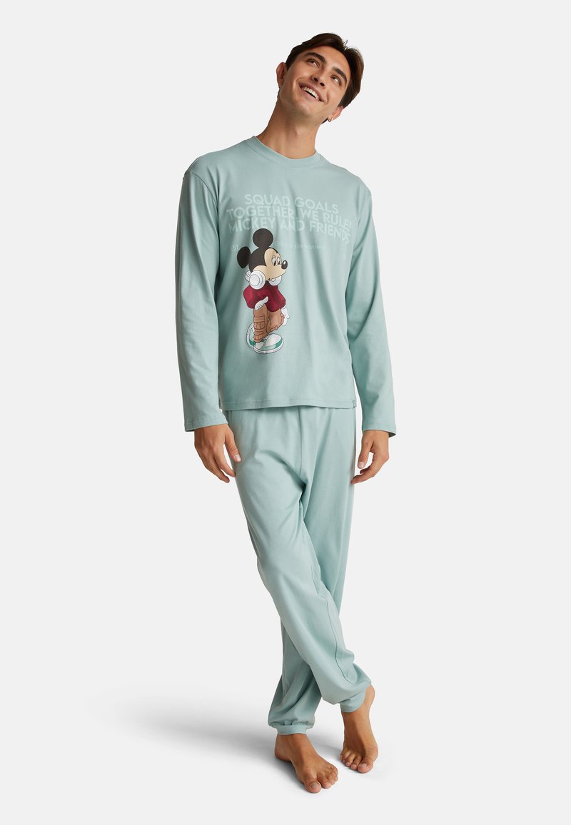 Helles Teal-Pyjama-Set aus weichem Stoff, bestehend aus einem Langarmoberteil mit Mickey-Maus-Grafik und Text. Die Hose hat elastische Bündchen.