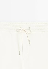 Massimo Dutti JOGGER FIT - Jogginghose - beige