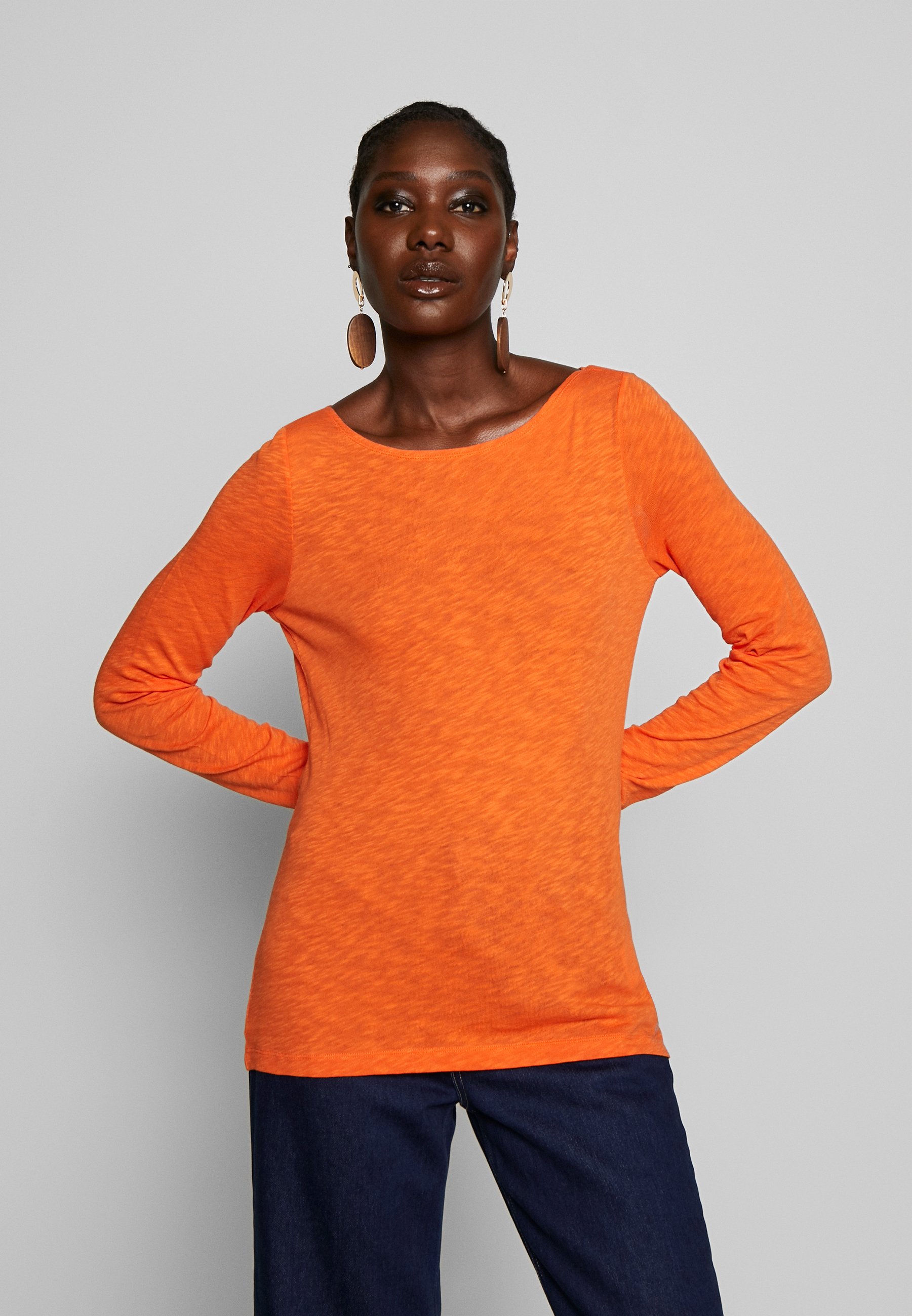 Oransje T skjorter & topper | Dame | Nye overdeler på Zalando Oransje T skjorter & topper | Dame | Nye overdeler på Zalando